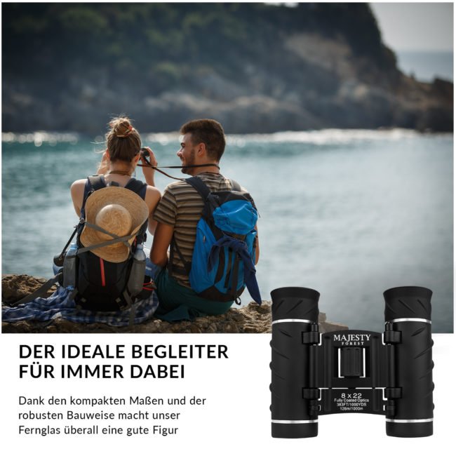 Young couple watching nature through binoculars